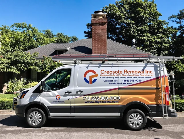 Northborough Chimney Sweep technician removing creosote safely in Northborough, MA